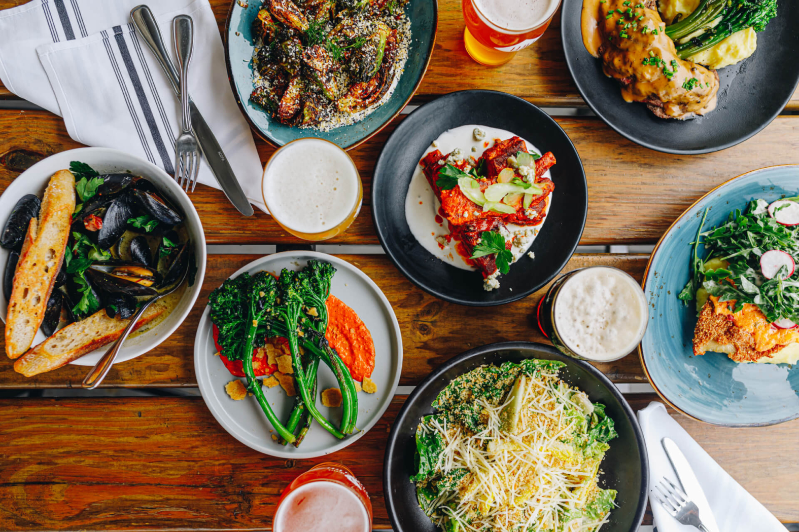 A full table of food at Wye Hill Brewing in Downtown Raleigh